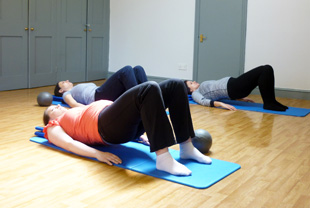 3 pregnant women doing an Ante Natal Pilates matwork classes with The Centred Body